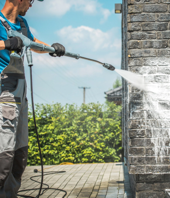 man doing soft washing